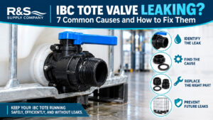 Close-up of an IBC tote discharge valve with liquid dripping from the outlet connection.